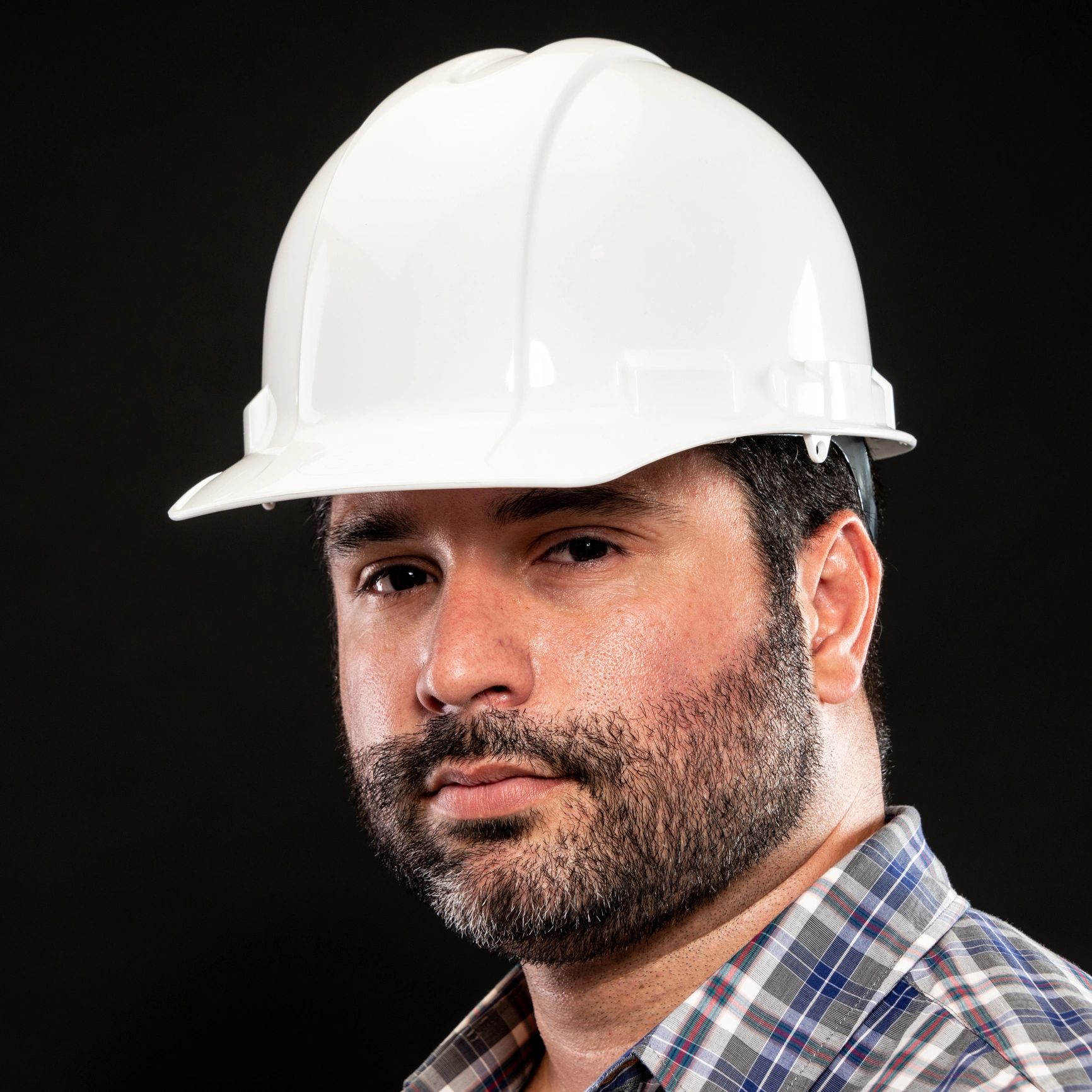 Bearded professional portrait on dark background