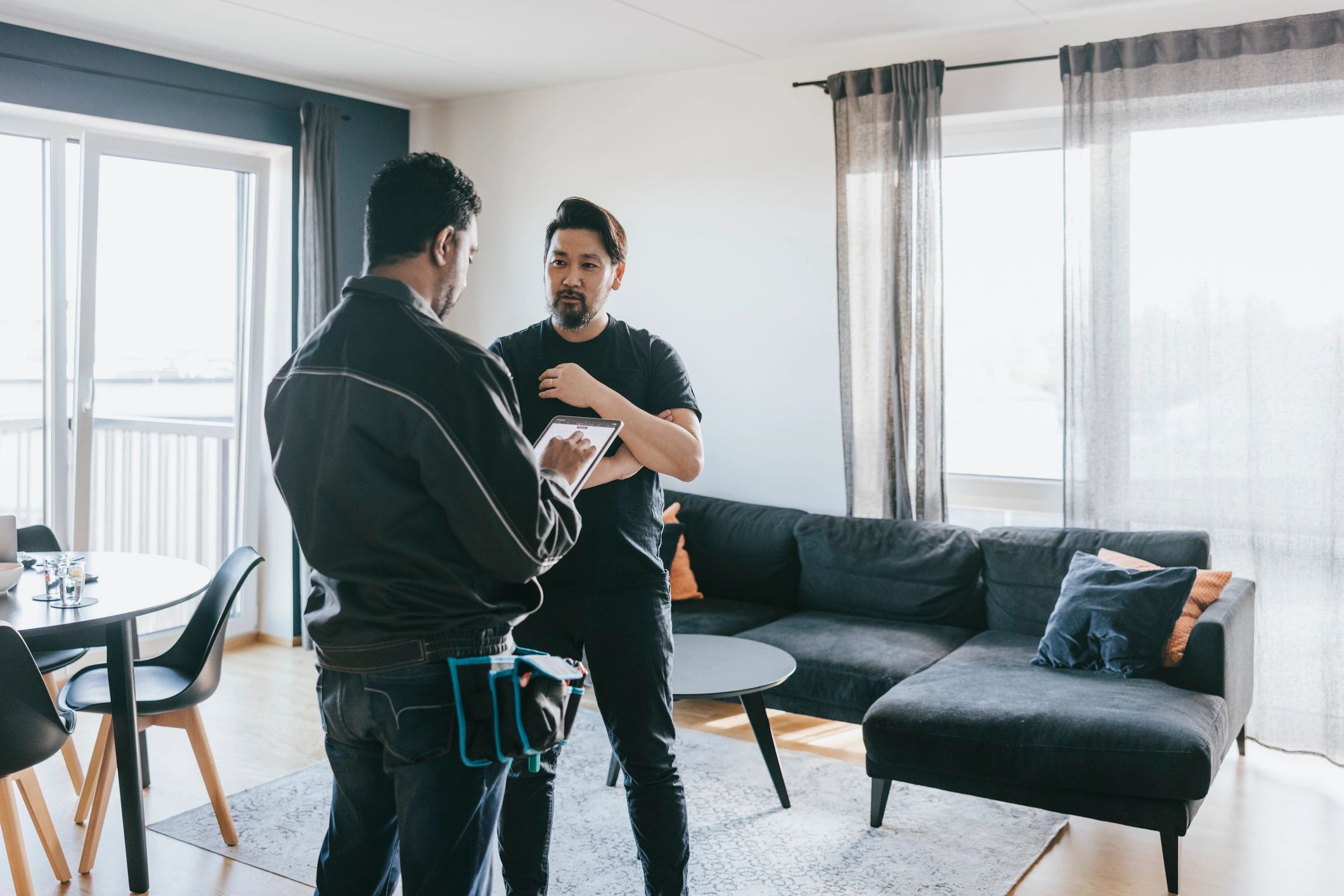 Technician speaking with a homeowner during a consultation